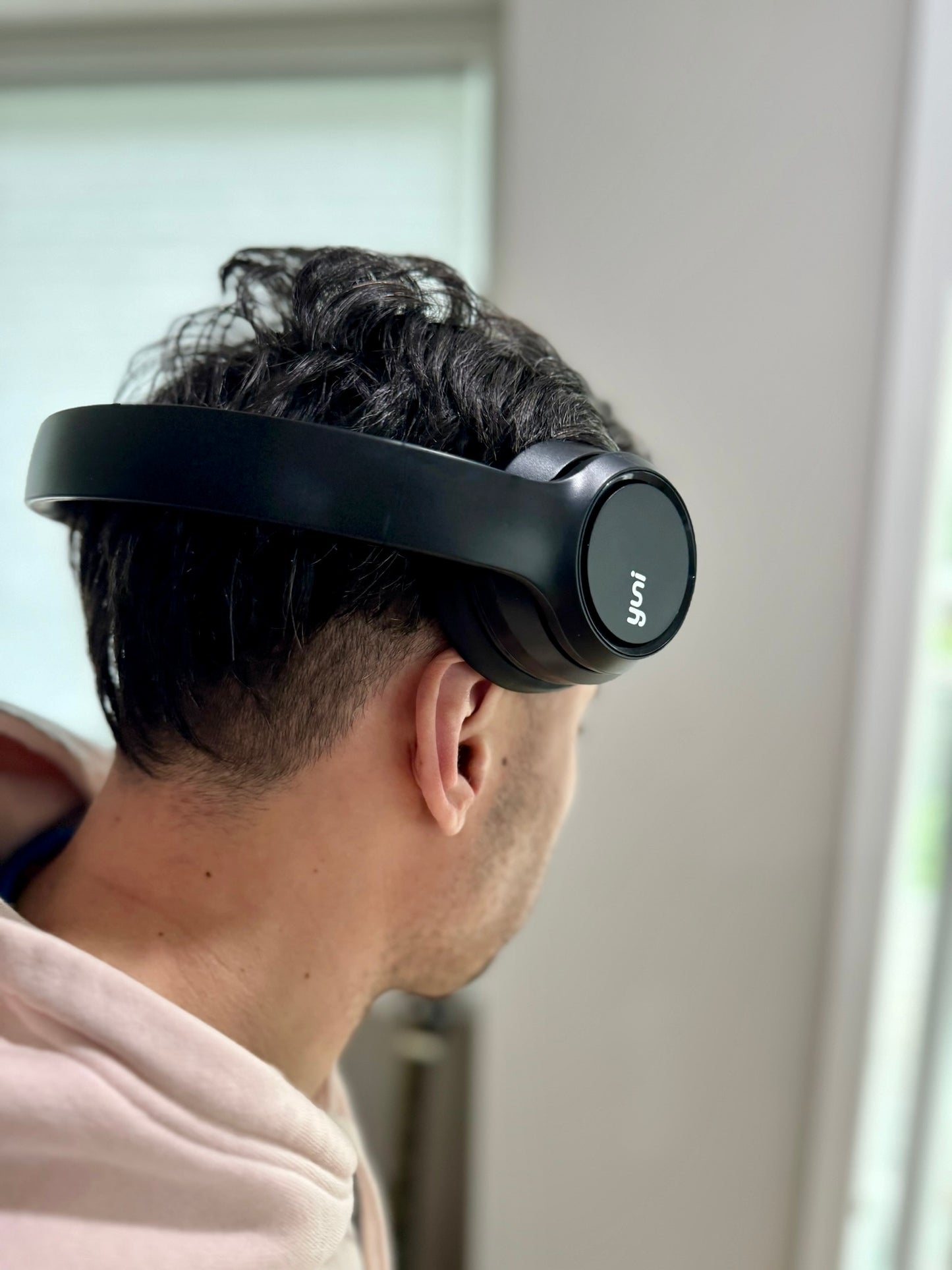 Model wearing Yuni Headphone, facing away