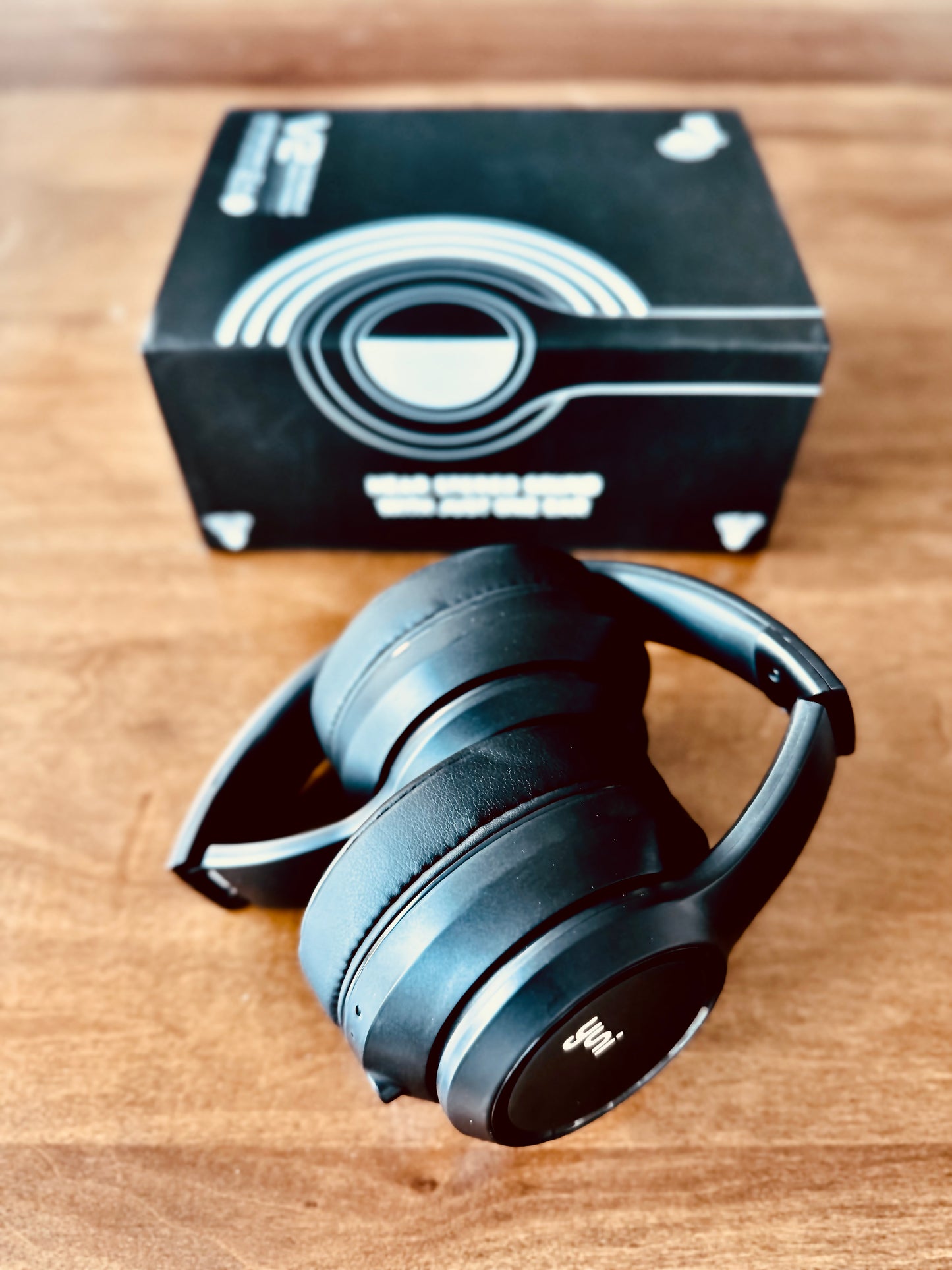 Folded Yuni v2 Headphones and product box