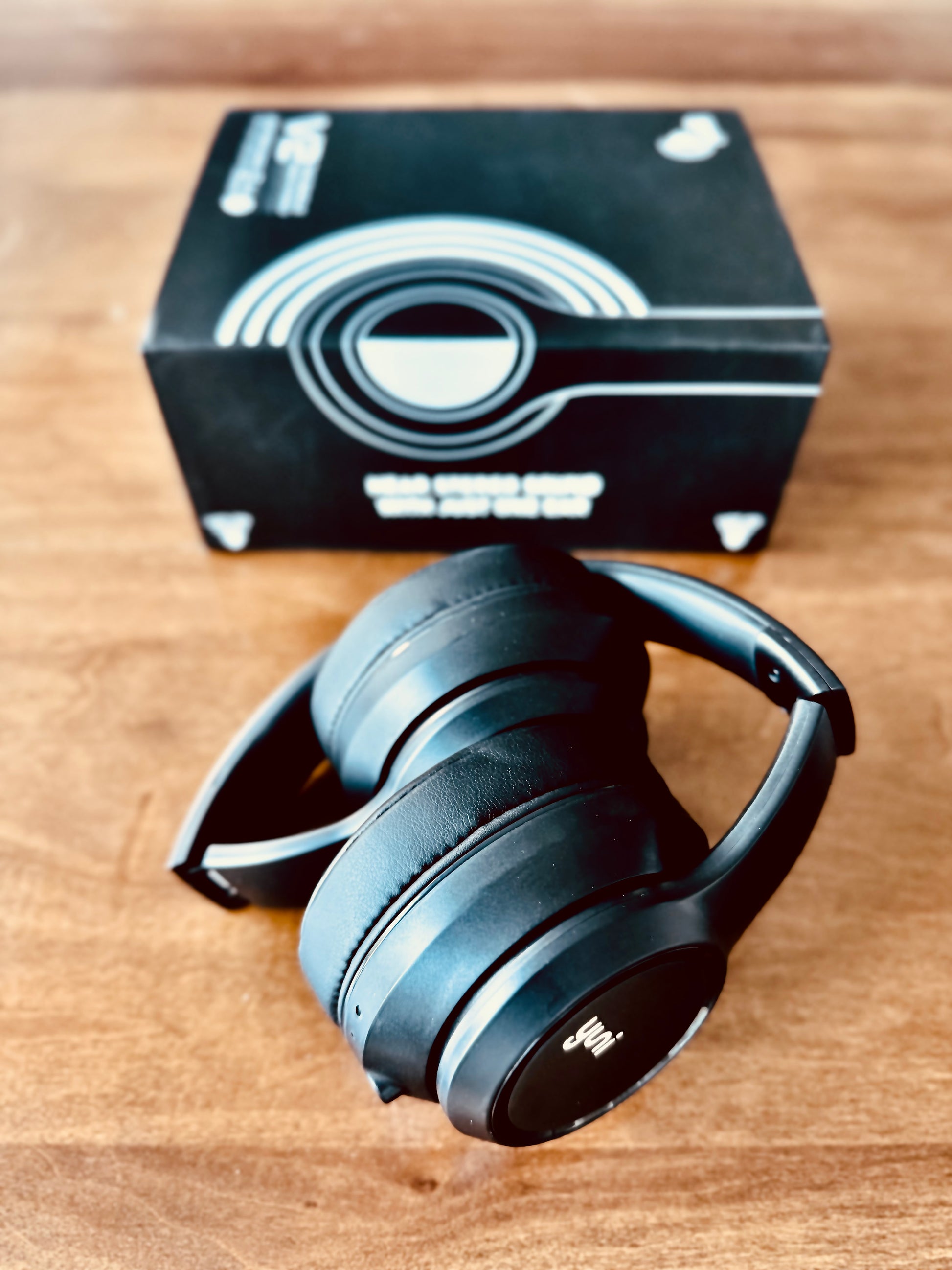 Folded Yuni v2 Headphones and product box