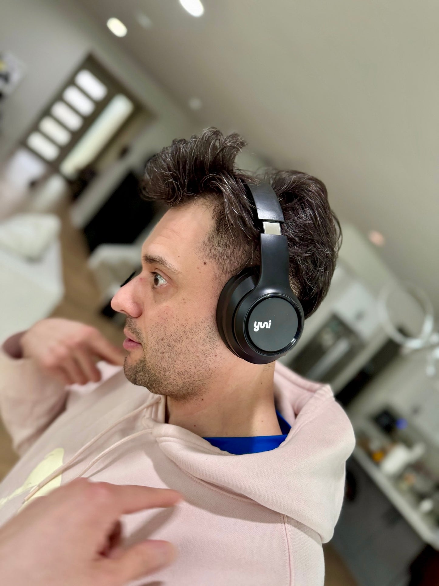 Model wearing Yuni Headphone, looking down and to the left